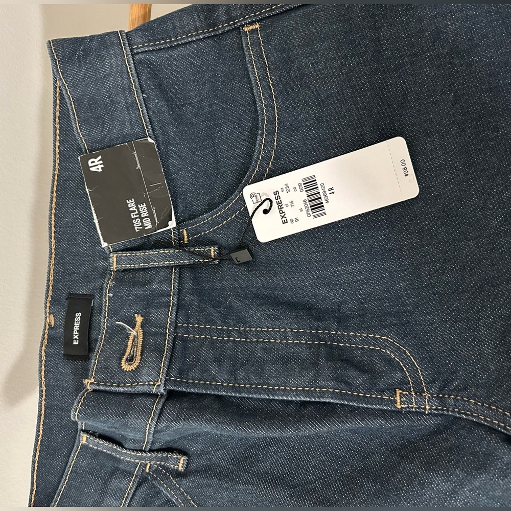 NWT size 4 70s flare mid rise dark jeans